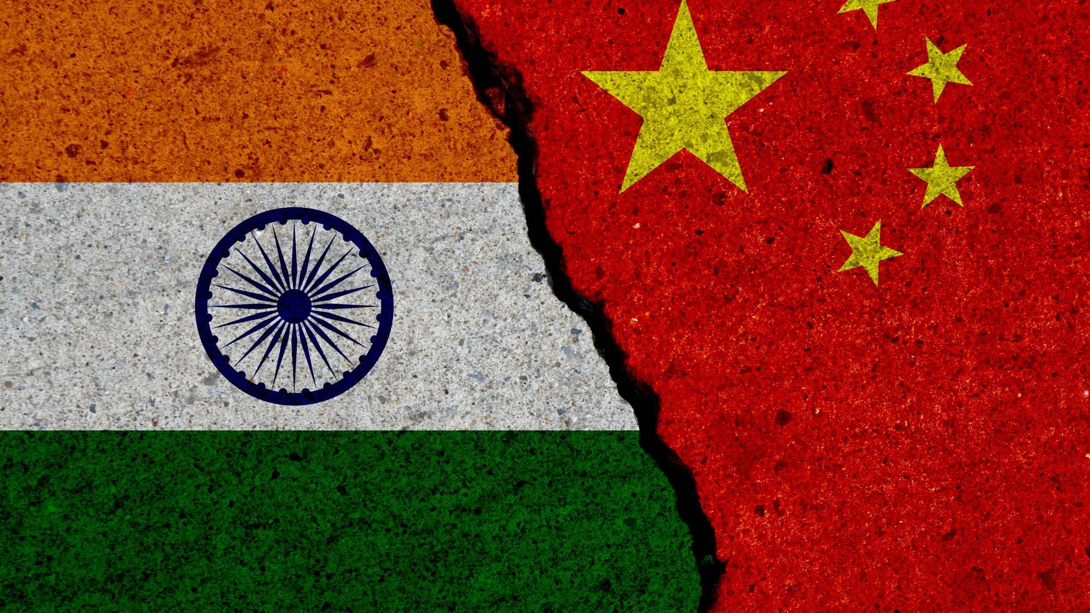 Concrete wall with painted Indian and Chinese flags