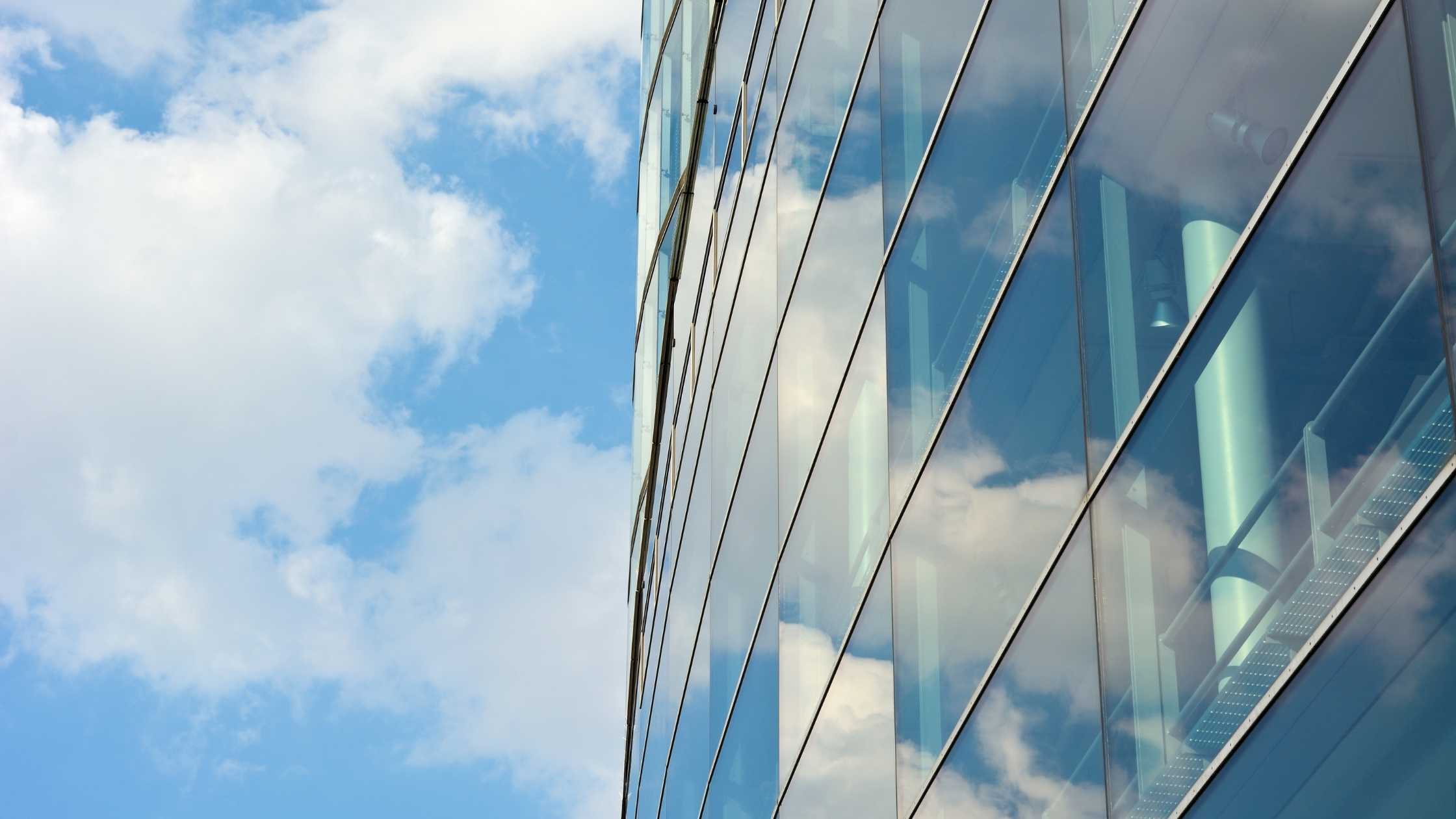 Contemporary architecture against cloudy blue sky