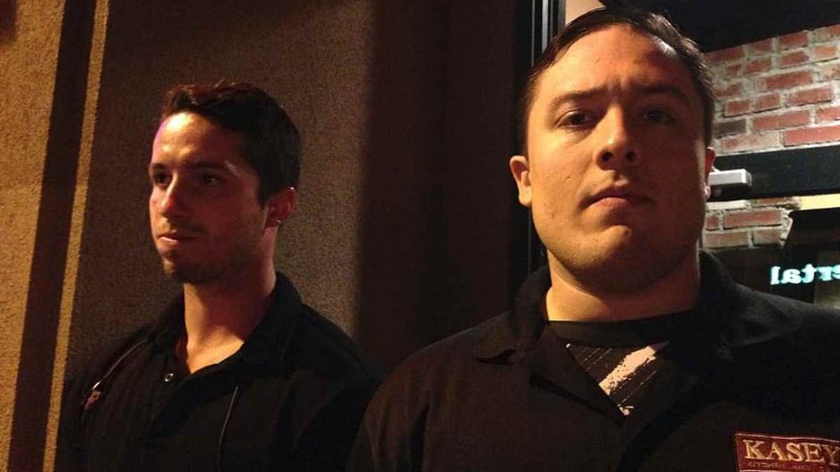 Two male bouncers outside a nightclub-1