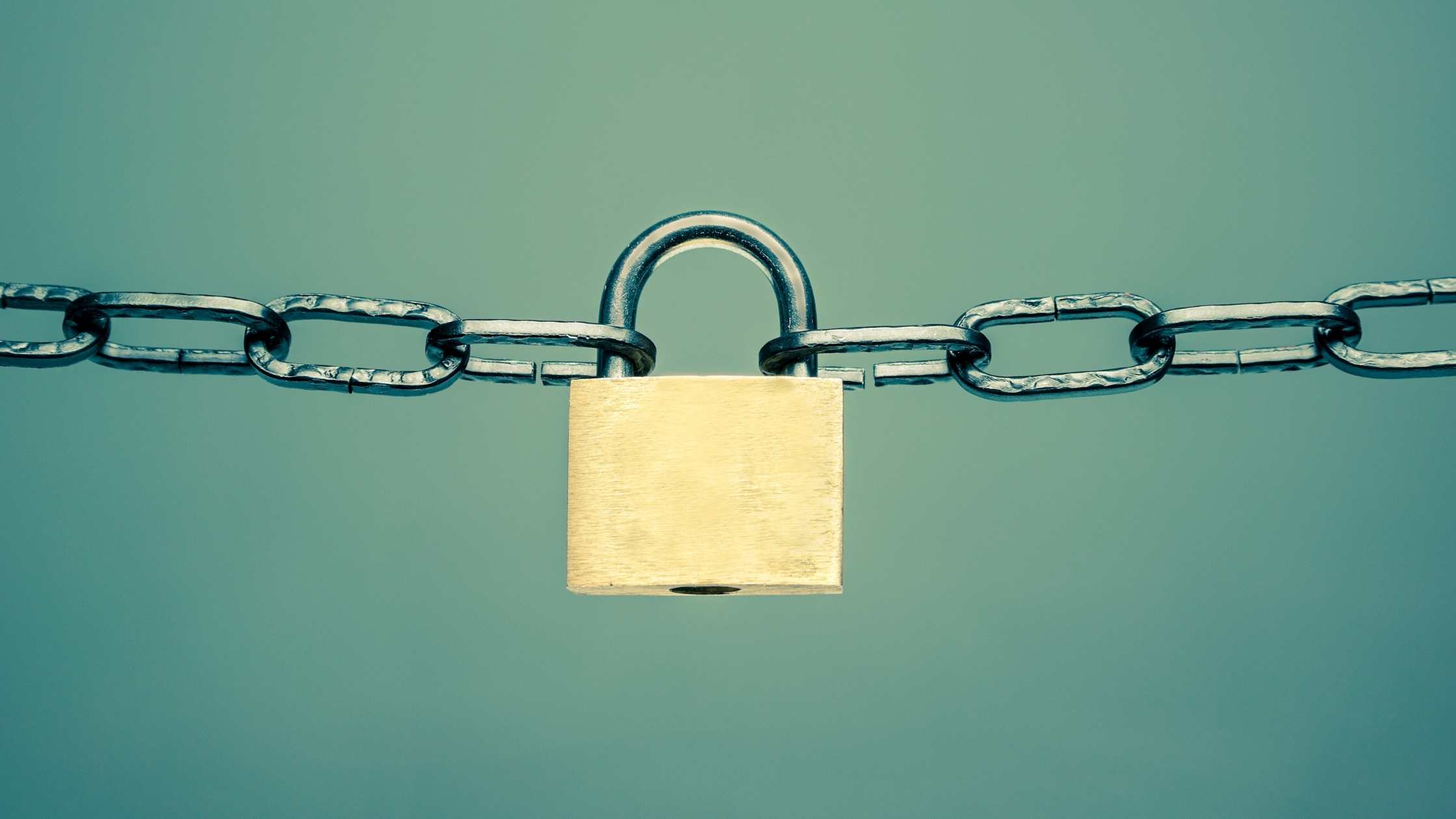 Cybersecurity concept;  chains linked by secure padlock