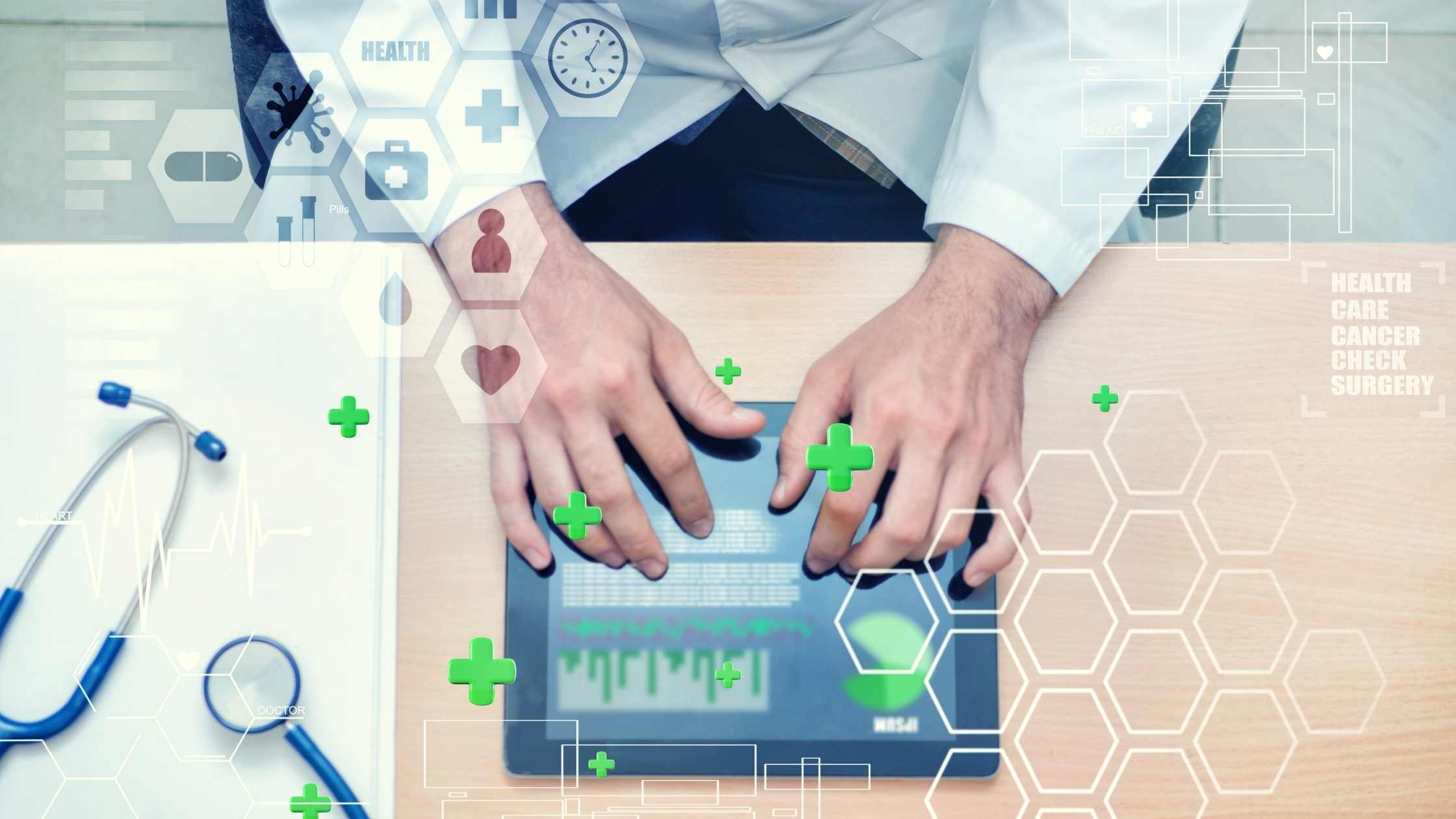 Digital healthcare concept; male doctor using tablet (1)