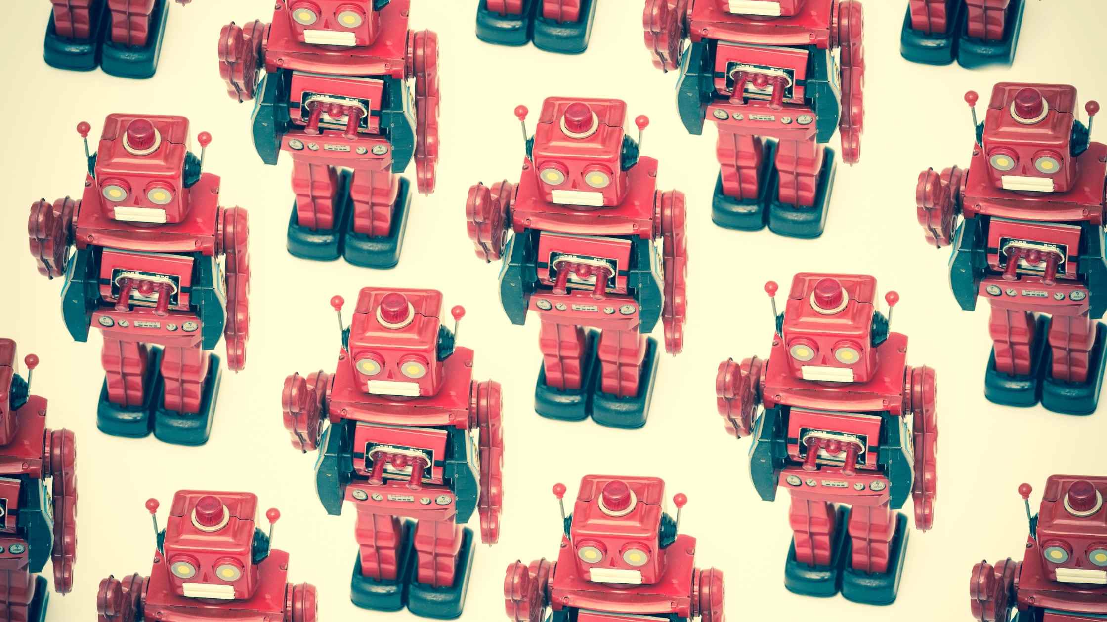 Group of red toy robots