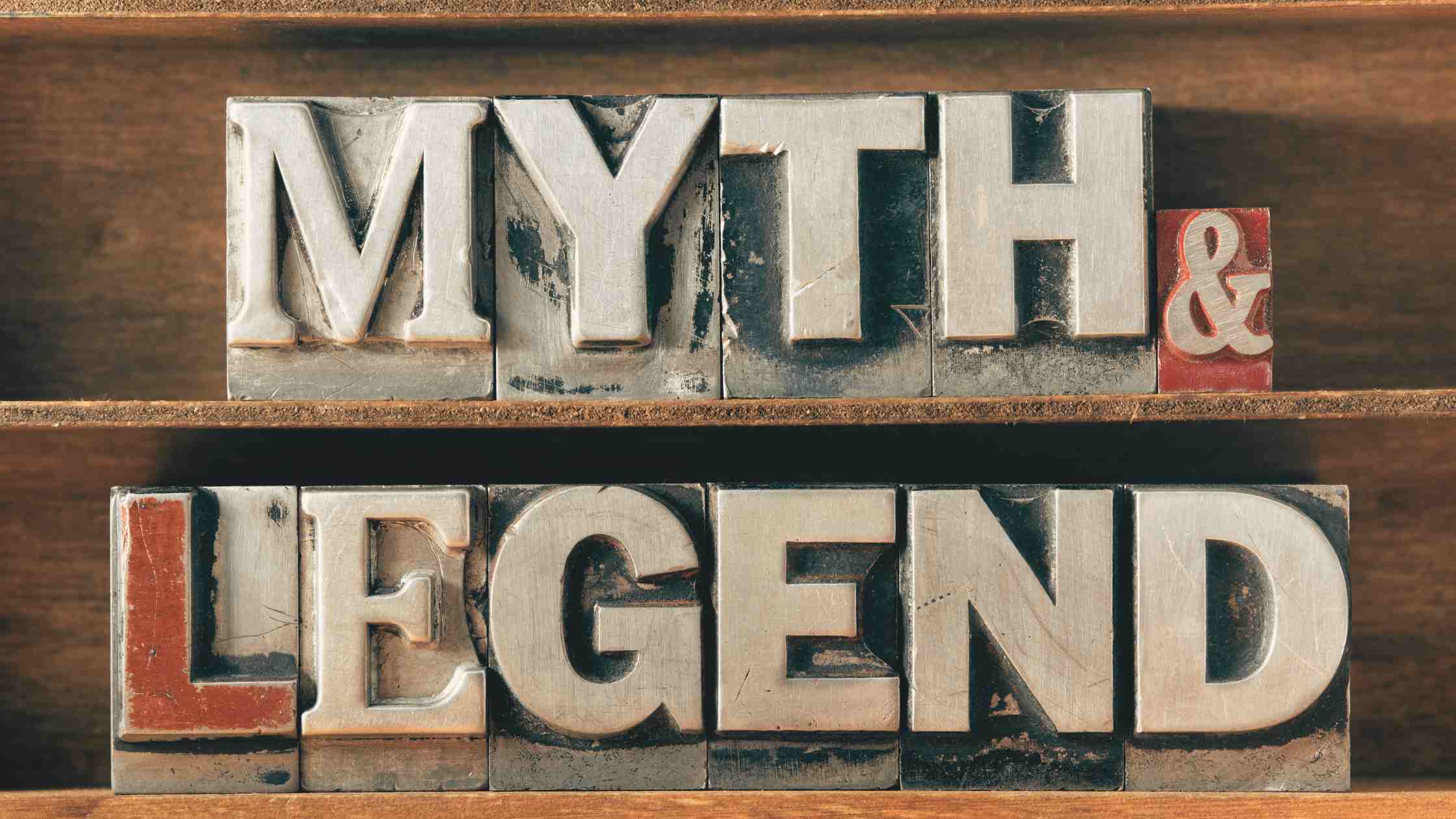 Myth and legend words made from metal letterpress type on wooden tray