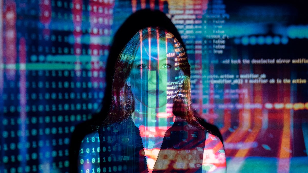 Binary Code Projected Over a Woman